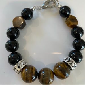 Beautiful bracelet for men  made by in semi precious stones.